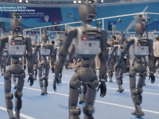 roboti, pochod, Reuters, NP